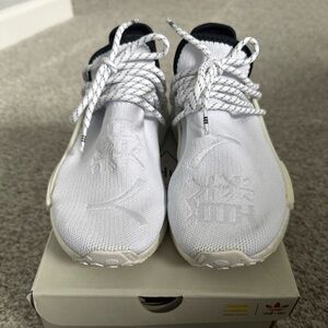 adidas human race Core White